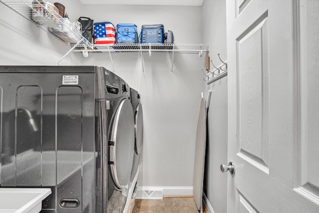 1258 Colby Dr, Forest, VA 24551 - laundry area featuring washer and dryer and baseboards