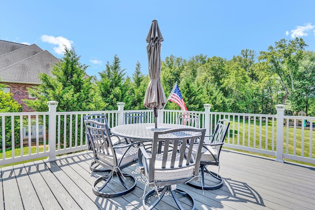 1258 Colby Dr, Forest, VA 24551 - deck featuring outdoor dining space, a lawn, and view of wooded area