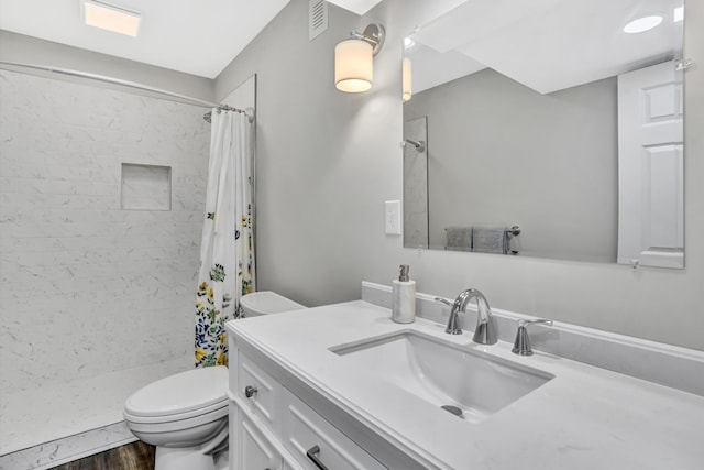 1258 Colby Dr, Forest, VA 24551 - bathroom featuring vanity, a tile shower, and wood finished floors