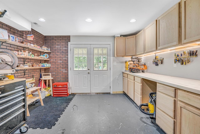 1258 Colby Dr, Forest, VA 24551 - interior space with brick wall, concrete floors, a workshop area, and recessed lighting