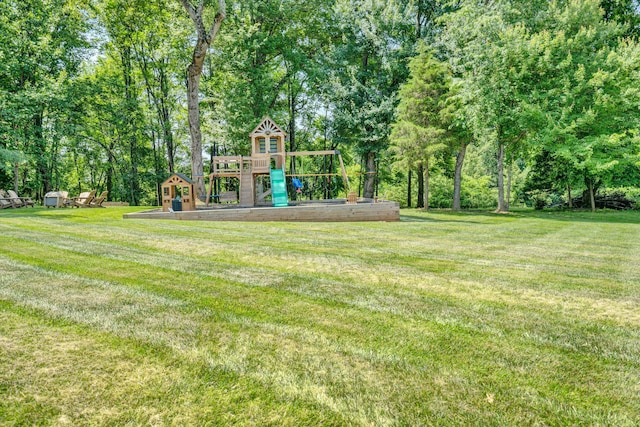 1258 Colby Dr, Forest, VA 24551 - view of grassy yard with a playground and view of wooded area