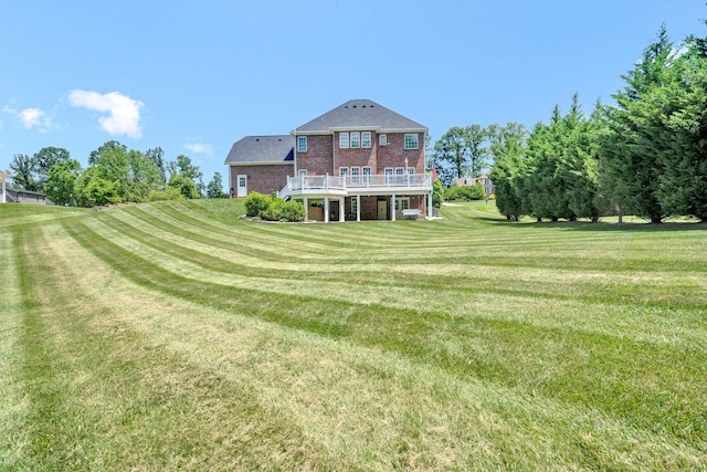 1258 Colby Dr, Forest, VA 24551 - rear view of property featuring brick siding, a deck, and a yard