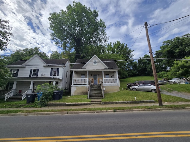 1213 Tazewell Ave SE, Roanoke, VA 24013 - view of front of house with a porch, stairway, and a front yard
