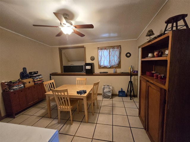 1213 Tazewell Ave SE, Roanoke, VA 24013 - dining area featuring light tile patterned floors, a ceiling fan, and ornamental molding