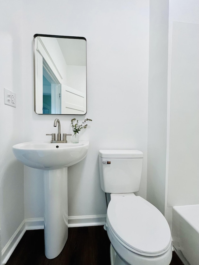 1138 Murray Ave SE, Roanoke, VA 24013 - bathroom with baseboards and wood finished floors