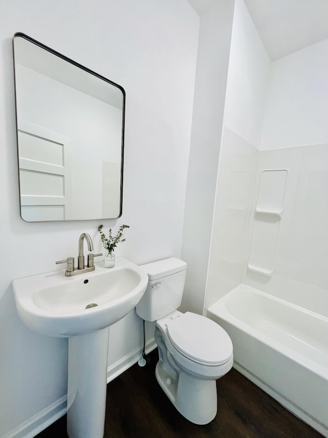 1138 Murray Ave SE, Roanoke, VA 24013 - bathroom with wood finished floors and shower / bath combination