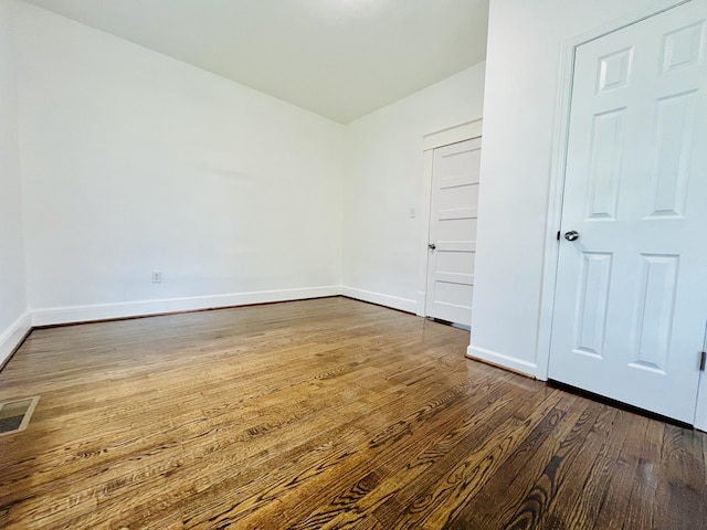1138 Murray Ave SE, Roanoke, VA 24013 - unfurnished bedroom featuring baseboards and dark wood-style flooring
