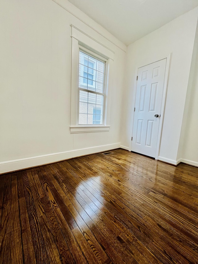 1138 Murray Ave SE, Roanoke, VA 24013 - unfurnished bedroom with wood-type flooring and baseboards