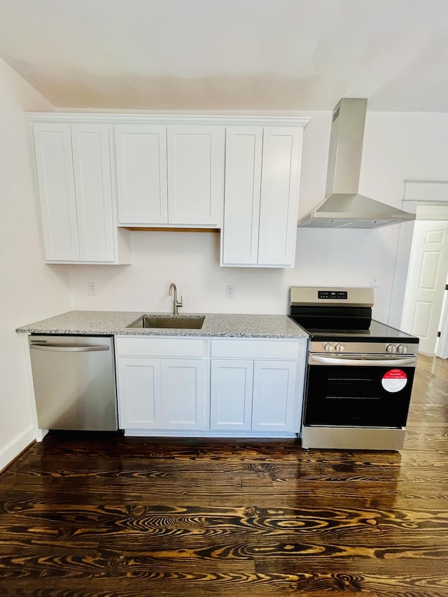 1138 Murray Ave SE, Roanoke, VA 24013 - kitchen featuring ventilation hood, stainless steel appliances, white cabinets, and dark wood-style floors