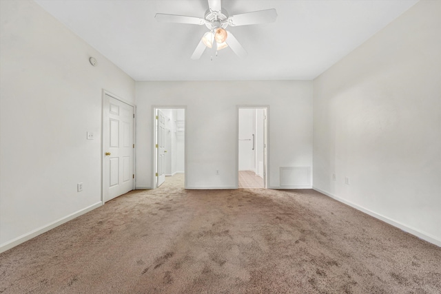6617 Hartman Ct, Roanoke, VA 24019 - unfurnished bedroom featuring carpet floors, a walk in closet, and ceiling fan