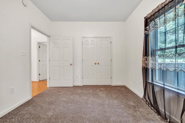 6617 Hartman Ct, Roanoke, VA 24019 - unfurnished bedroom featuring carpet floors and a closet