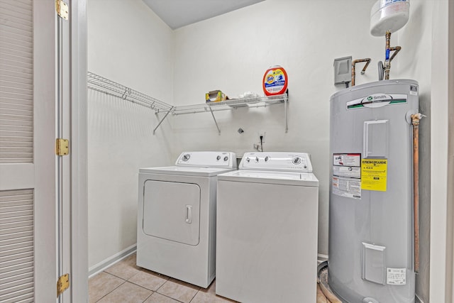 6617 Hartman Ct, Roanoke, VA 24019 - laundry area with electric water heater, separate washer and dryer, and light tile patterned flooring