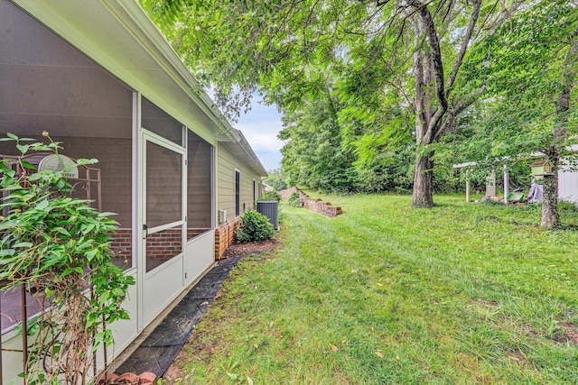6617 Hartman Ct, Roanoke, VA 24019 - view of green lawn with a sunroom
