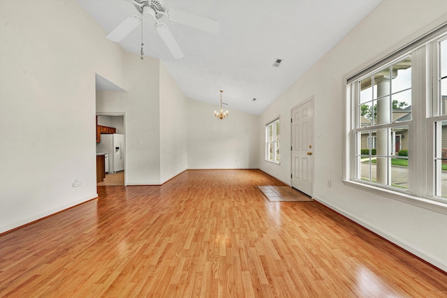 6617 Hartman Ct, Roanoke, VA 24019 - unfurnished living room featuring a chandelier, light wood finished floors, a ceiling fan, and high vaulted ceiling