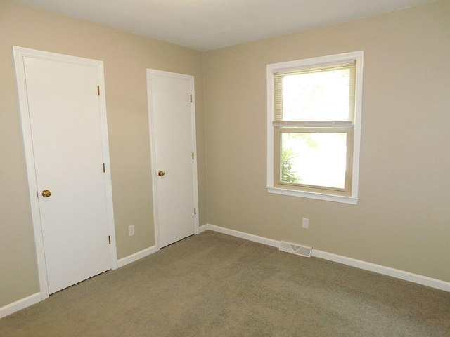 4230 Belford St SW, Roanoke, VA 24018 - unfurnished bedroom featuring carpet and baseboards
