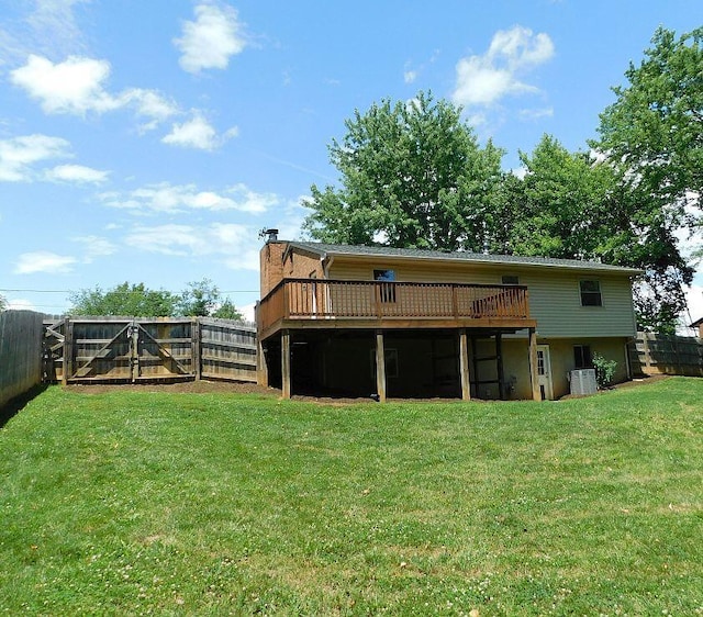 4230 Belford St SW, Roanoke, VA 24018 - back of house with a deck, a fenced backyard, and a chimney