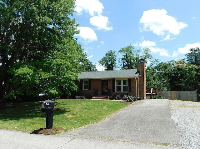 4230 Belford St SW, Roanoke, VA 24018 - ranch-style house featuring asphalt driveway and a chimney