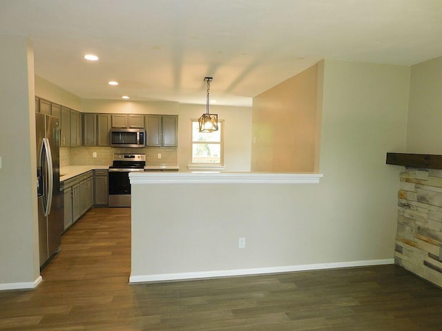 4230 Belford St SW, Roanoke, VA 24018 - kitchen with appliances with stainless steel finishes, gray cabinetry, dark wood-style floors, decorative backsplash, and recessed lighting
