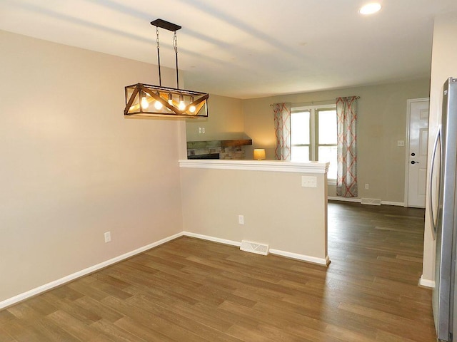 4230 Belford St SW, Roanoke, VA 24018 - unfurnished room with dark wood-style flooring and recessed lighting