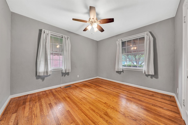 755 Brandon Ave SW, Roanoke, VA 24015 - empty room with a ceiling fan and wood finished floors
