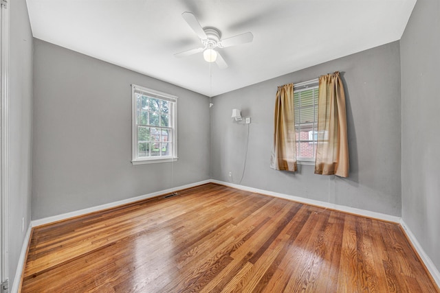 755 Brandon Ave SW, Roanoke, VA 24015 - unfurnished room featuring wood finished floors and a ceiling fan