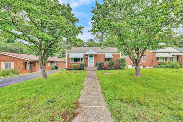 755 Brandon Ave SW, Roanoke, VA 24015 - view of front of property with a front lawn and brick siding