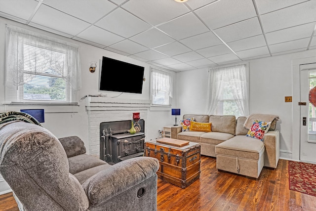 1831 S Carpenter Dr, Covington, VA 24426 - living area with hardwood / wood-style flooring, a paneled ceiling, and plenty of natural light
