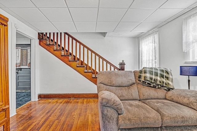 1831 S Carpenter Dr, Covington, VA 24426 - living area with wood finished floors, a paneled ceiling, and stairs