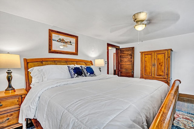 1831 S Carpenter Dr, Covington, VA 24426 - bedroom featuring wood finished floors and a ceiling fan