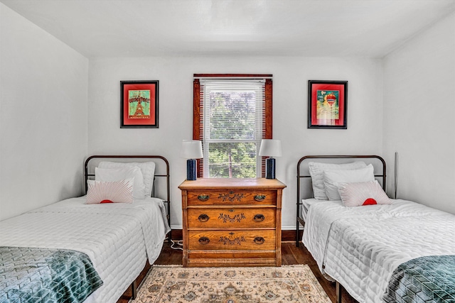 1831 S Carpenter Dr, Covington, VA 24426 - bedroom featuring wood finished floors and baseboards