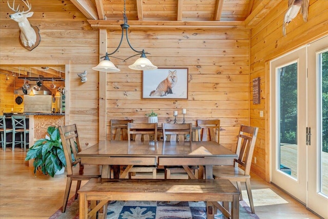 1769 Scenic View Rd, Moneta, VA 24121 - dining space with a wooden ceiling with exposed beams, wood walls, and wood finished floors