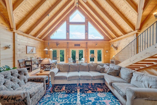 1769 Scenic View Rd, Moneta, VA 24121 - living room featuring wooden walls, a wooden ceiling with exposed beams, healthy amount of natural light, high vaulted ceiling, and french doors