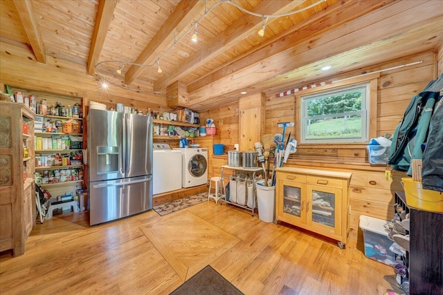 1769 Scenic View Rd, Moneta, VA 24121 - kitchen with stainless steel fridge, washing machine and clothes dryer, a wooden ceiling with exposed beams, wood walls, and wood finished floors
