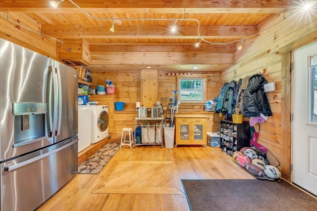 1769 Scenic View Rd, Moneta, VA 24121 - kitchen featuring stainless steel fridge with ice dispenser, washing machine and dryer, a wooden ceiling with exposed beams, wood walls, and wood finished floors