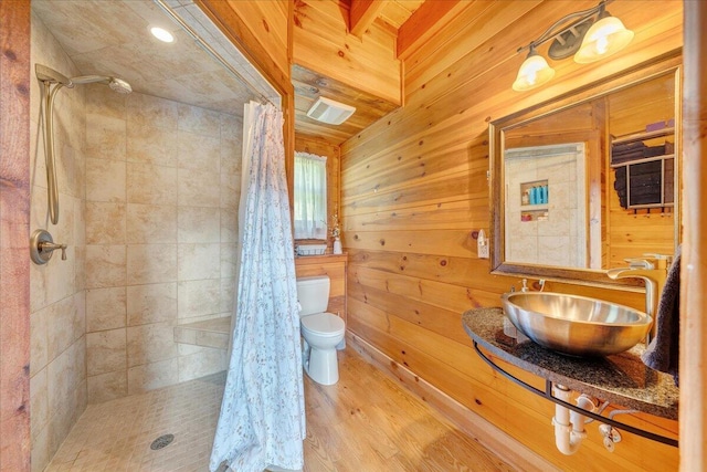 1769 Scenic View Rd, Moneta, VA 24121 - bathroom with a tile shower, wood finished floors, and wood walls