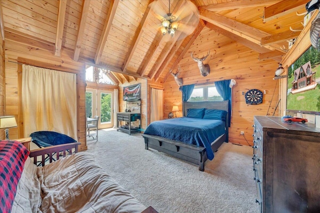 1769 Scenic View Rd, Moneta, VA 24121 - bedroom with wood walls, a wood ceiling with exposed beams, carpet flooring, high vaulted ceiling, and access to exterior