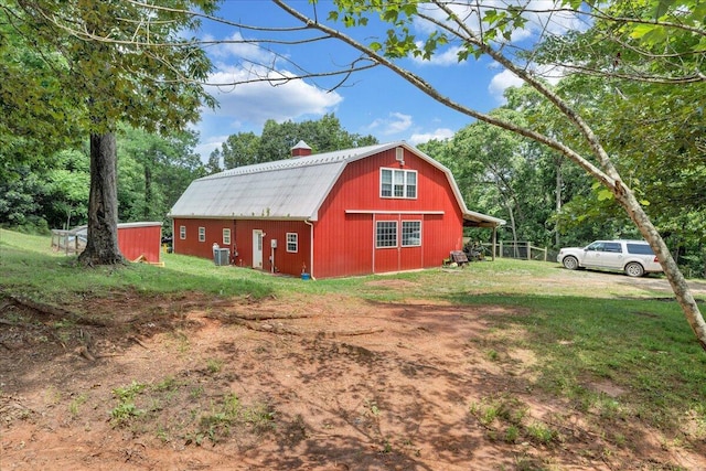 1769 Scenic View Rd, Moneta, VA 24121 - view of property exterior featuring a gambrel roof, a lawn, an outdoor structure, and a chimney