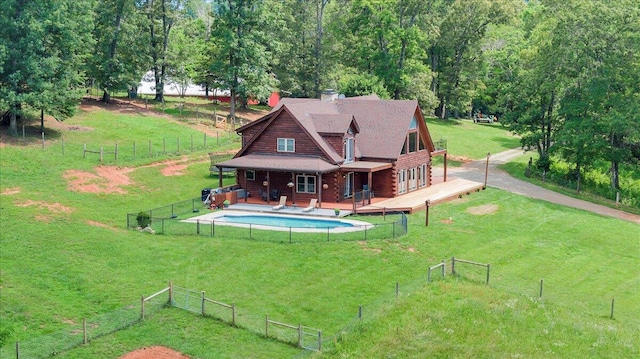 1769 Scenic View Rd, Moneta, VA 24121 - rear view of house featuring a wooden deck, log siding, a fenced backyard, and a chimney