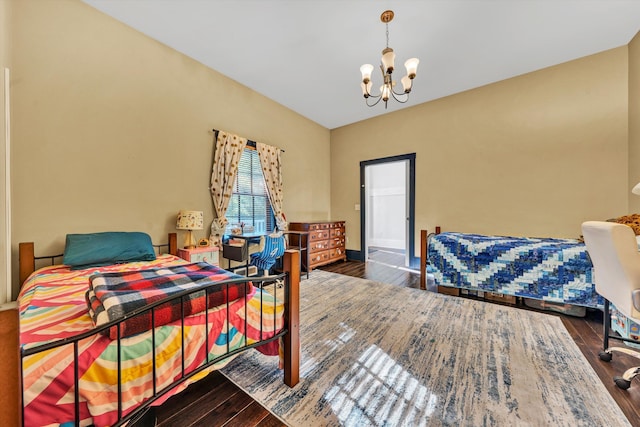 3150 Green Ridge Rd NW, Roanoke, VA 24019 - bedroom featuring wood-type flooring and a chandelier