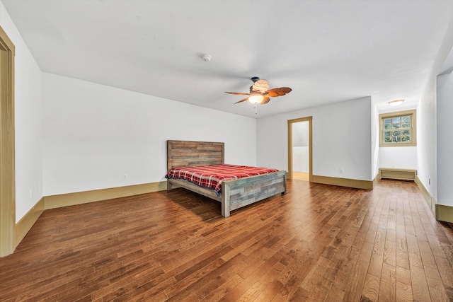 3150 Green Ridge Rd NW, Roanoke, VA 24019 - bedroom featuring wood-type flooring, ceiling fan, and baseboard heating
