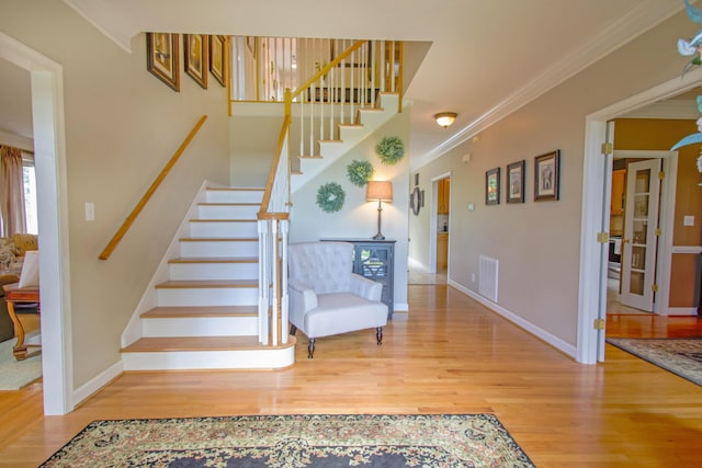 1266 Wills Way, Forest, VA 24551 - staircase with wood finished floors and ornamental molding