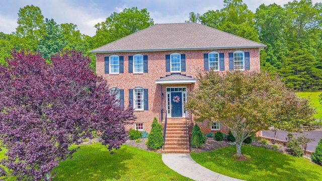 1266 Wills Way, Forest, VA 24551 - colonial-style house with a front yard and brick siding