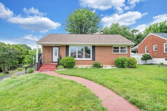 1709 Coveland Dr NW, Roanoke, VA 24017 - view of front of property with brick siding, roof with shingles, and a chimney