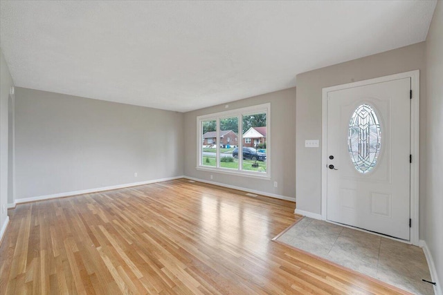 1709 Coveland Dr NW, Roanoke, VA 24017 - foyer with light wood-type flooring and baseboards
