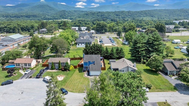 3341 Fort Lewis Cir, Salem, VA 24153 - aerial perspective of suburban area featuring a heavily wooded area and a mountain backdrop