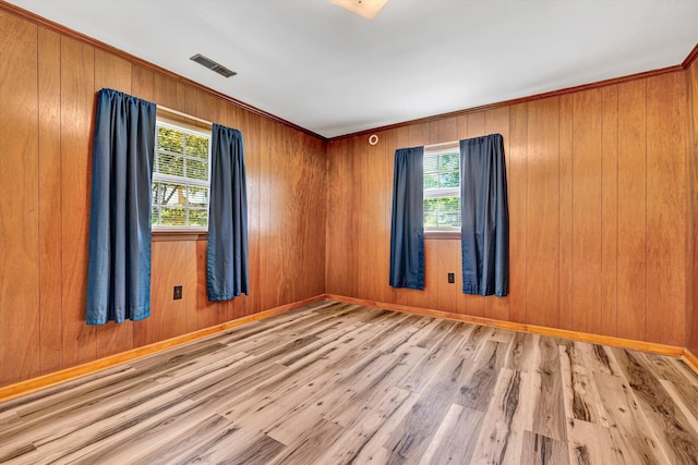 3716 Bower Rd, Roanoke, VA 24018 - spare room with plenty of natural light, wood finished floors, wooden walls, and crown molding
