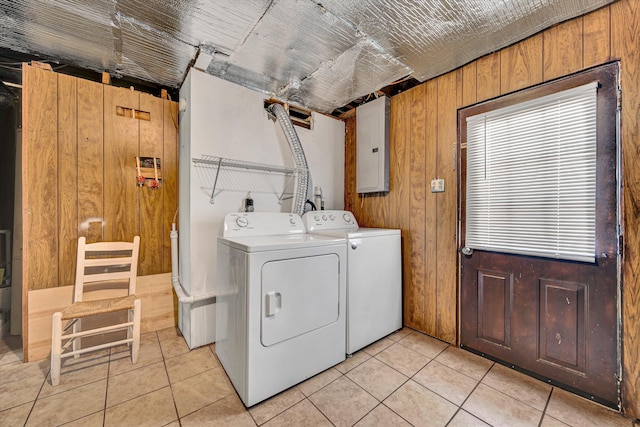 3716 Bower Rd, Roanoke, VA 24018 - laundry area with electric panel, independent washer and dryer, wood walls, and light tile patterned floors