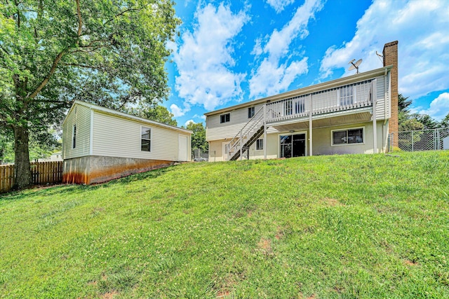 3716 Bower Rd, Roanoke, VA 24018 - rear view of house with stairway, a fenced backyard, a chimney, stucco siding, and a deck