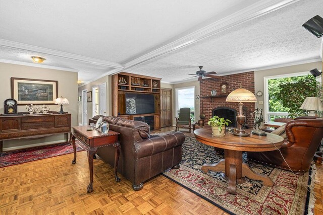 420 Cresthill Rd, Lynchburg, VA 24504 - living area with ornamental molding, a brick fireplace, a ceiling fan, and a textured ceiling