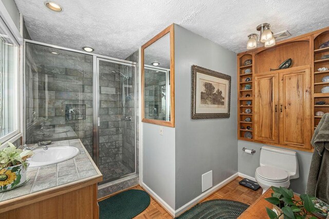 420 Cresthill Rd, Lynchburg, VA 24504 - bathroom featuring a stall shower, vanity, a textured ceiling, and recessed lighting